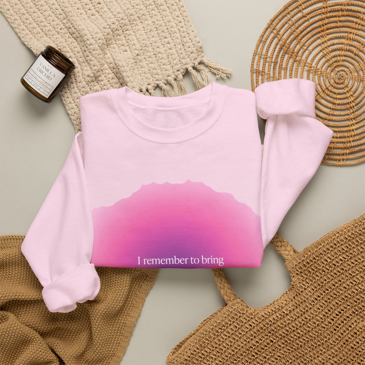 Sweat-shirt Muta aquarelle rose, à plat sur fond clair