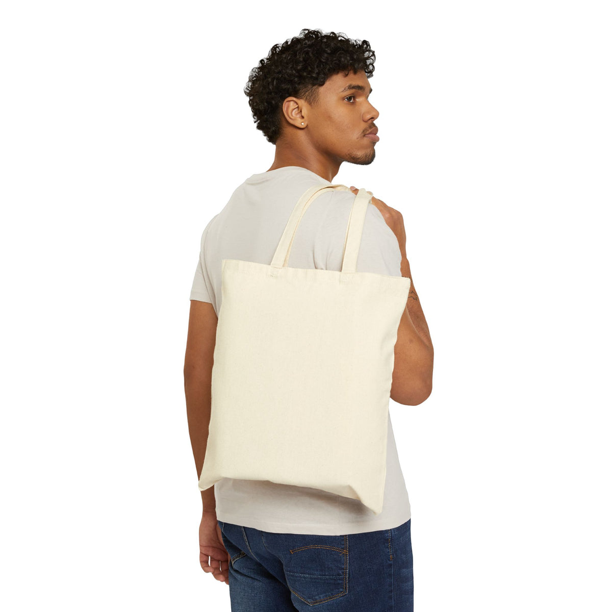 Tote bag Muta en toile naturelle, porté à l'épaule