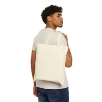 Tote bag Muta en toile naturelle, porté à l'épaule